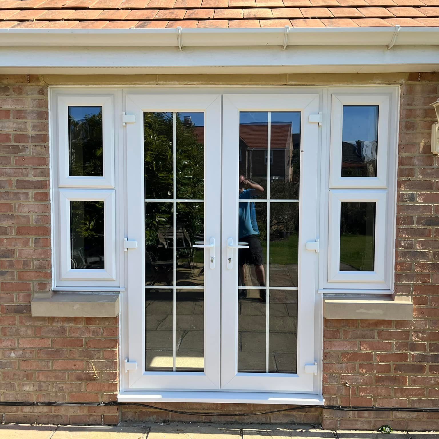 White full length wpvc window doors on extension